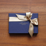 こちらは<a style="text-decoration: underline; font-weight: bold;" href="https://munekawa.jp/collections/all-small-leather-goods">革小物等</a>のラッピングです。<br>
※アイテムごとのラッピング仕様は、各商品ページをご確認ください。